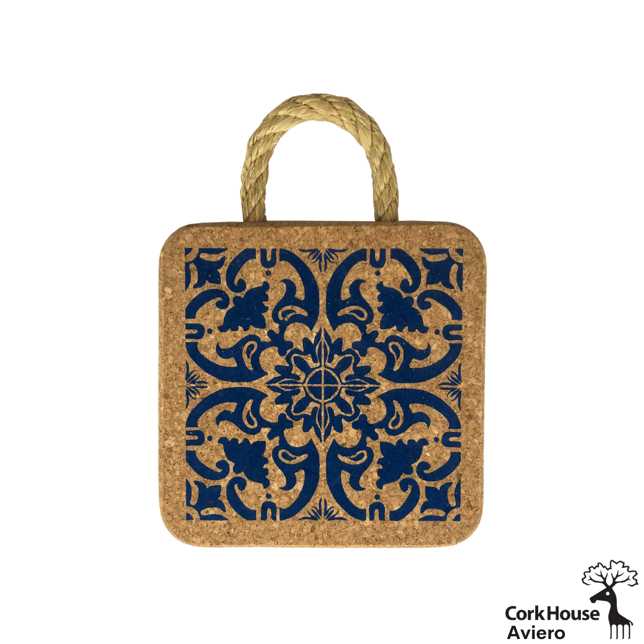 This cork hot pad features a rope handle for hanging and a cobalt blue traditional tile pattern. 