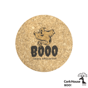 Cork coaster with a sheet ghost hovering over the word "booo" and happy halloween