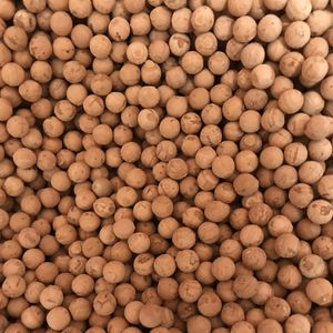 A view into a tub of small natural cork balls.