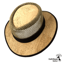 A view slightly from the top of the cork safari hat highlighting the wicker crown and dark brown cork brim binding and rim.