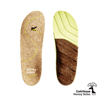 A pair of honey soles the one on the left showing the cork top of the insole and the one on the right showing the cork and rubber bottom. 