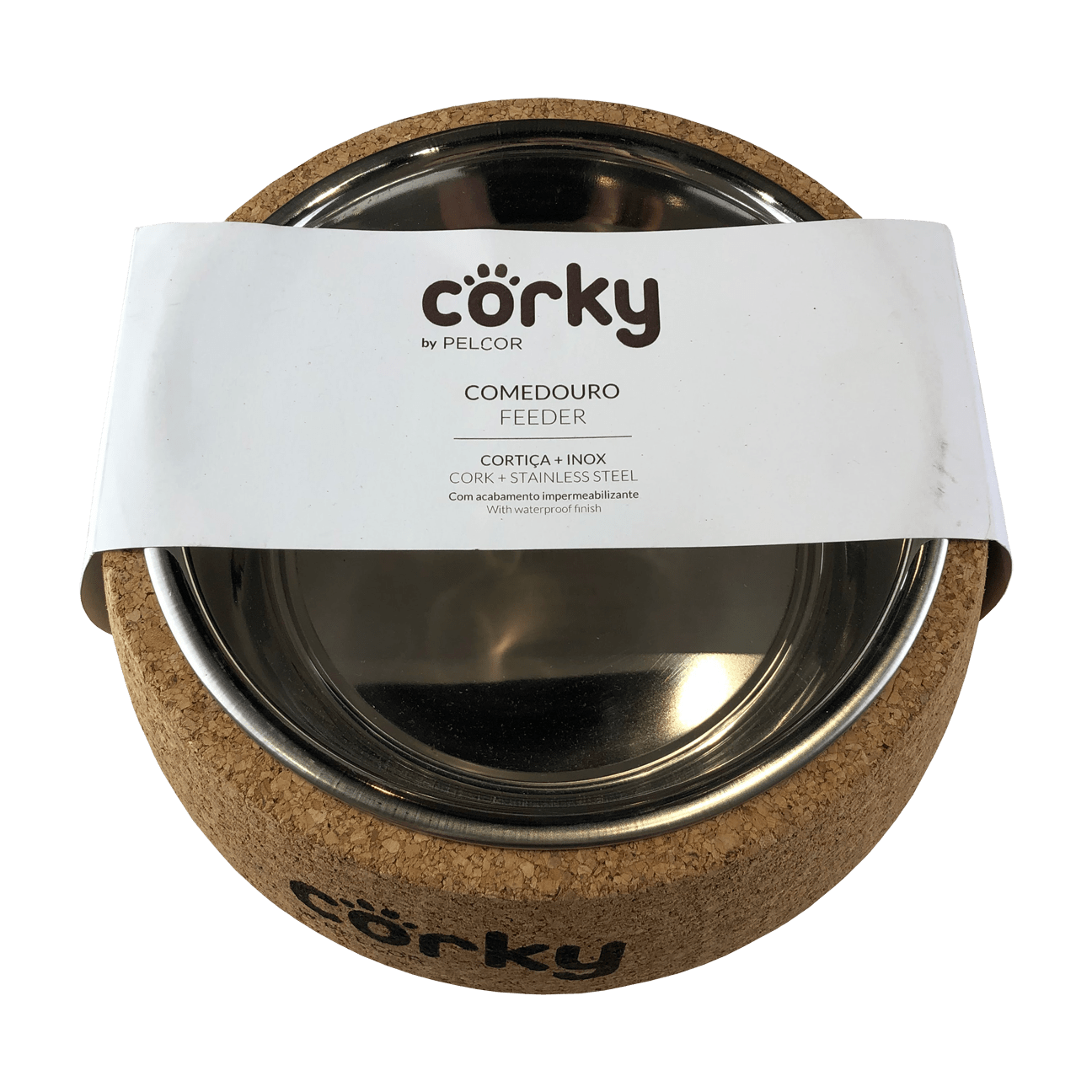A stainless steel dog bowl in a natural cork holder with "corky" written in black on the front of the cork. The bowl is in a paper sleeve which says "corky by pelcor cork and stainless steel feeder"