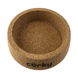 The cork base without the stainless steel bowl showing the "corky" written on the front of the base. 