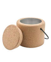 A stainless steel ice bucket with a natural cork exterior and cap.